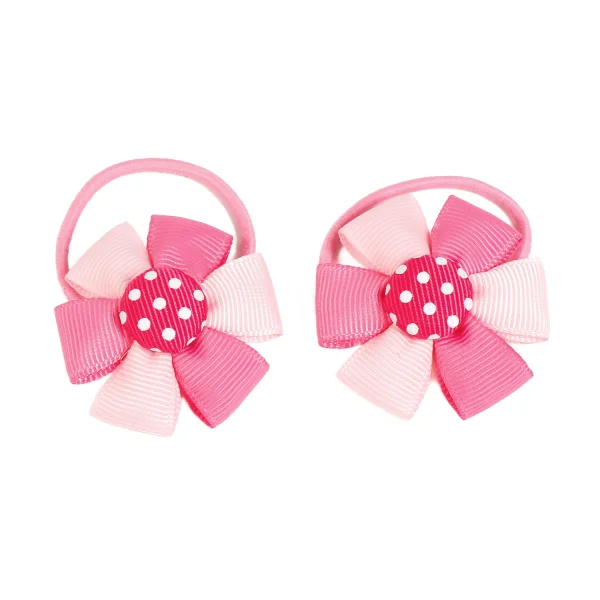 Cột tóc bé gái đính nơ in hình chấm bi