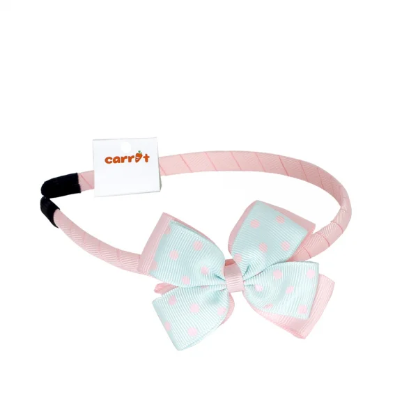 Cài tóc bé gái dính nơ in hình chấm bi