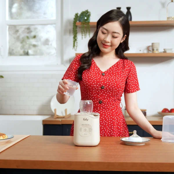 Máy hâm sữa và tiệt trùng điện tử Mono 11