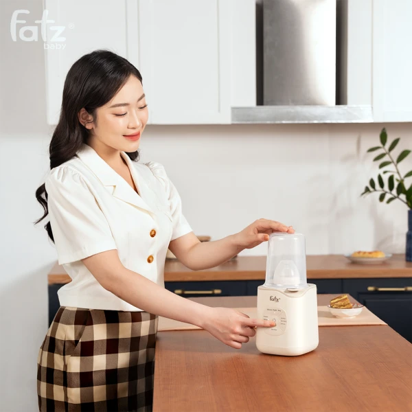 Máy hâm sữa và tiệt trùng điện tử Mono 11